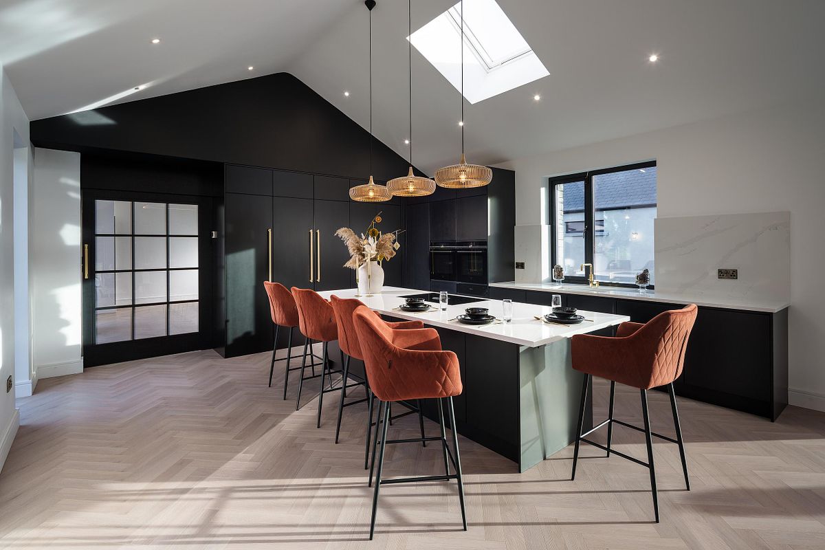 Modern Dark-Themed Kitchen by DWK