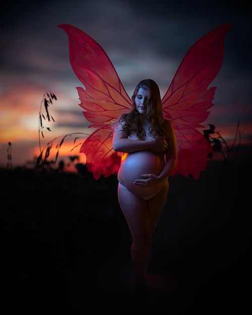 Creative portrait of a pregnant fairy.