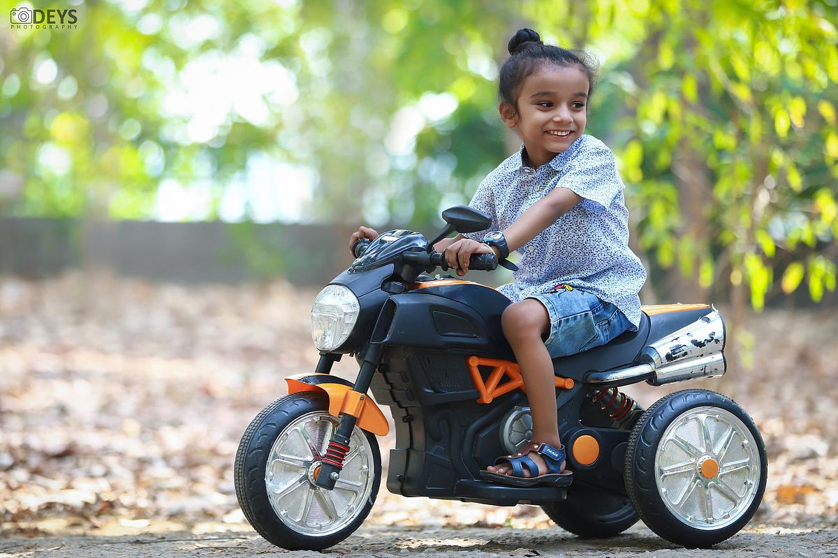 Kid riding a bike photoshoot