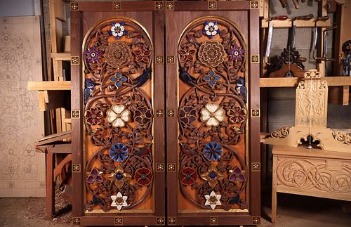 Richly carved and painted doors for the altarpiece at St. Bernadette Catholic Church