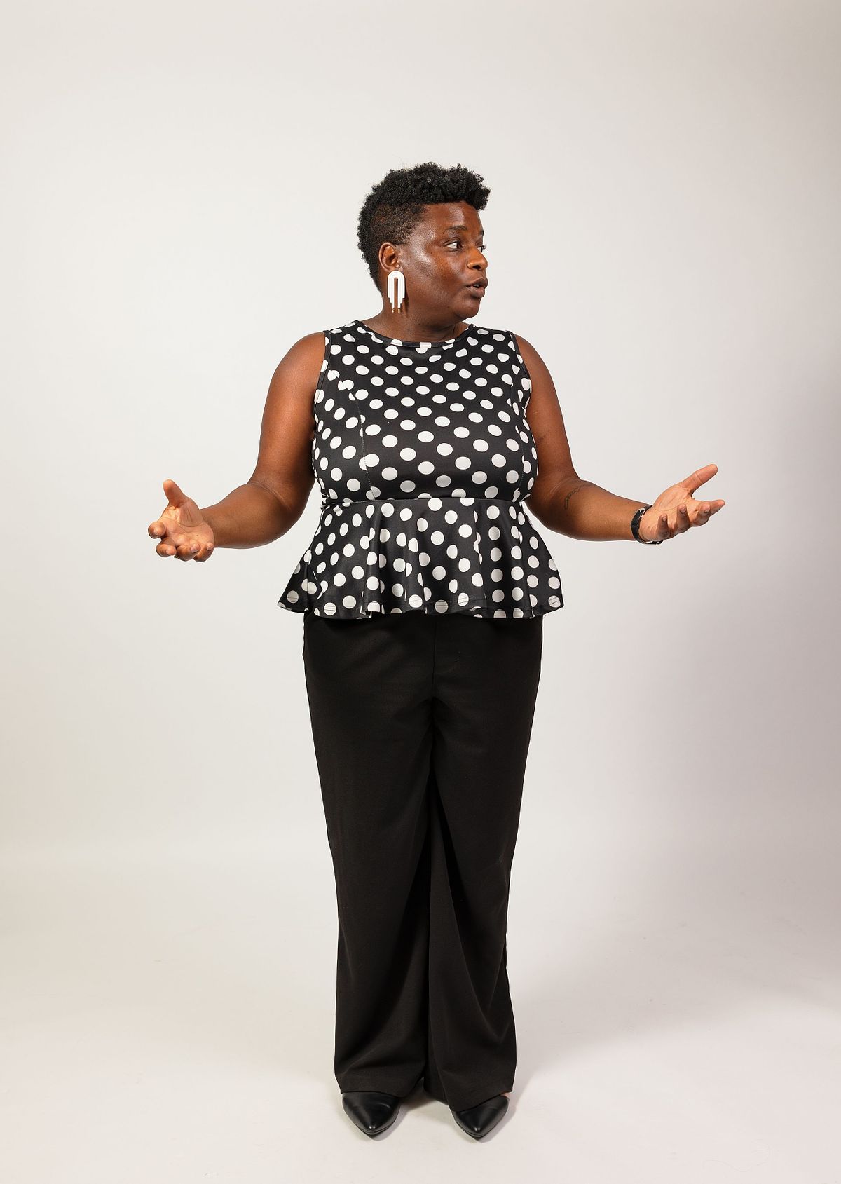 A full-body photograph of a woman against a white backdrop at Innovate Carolina's offices in Chapel Hill, NC