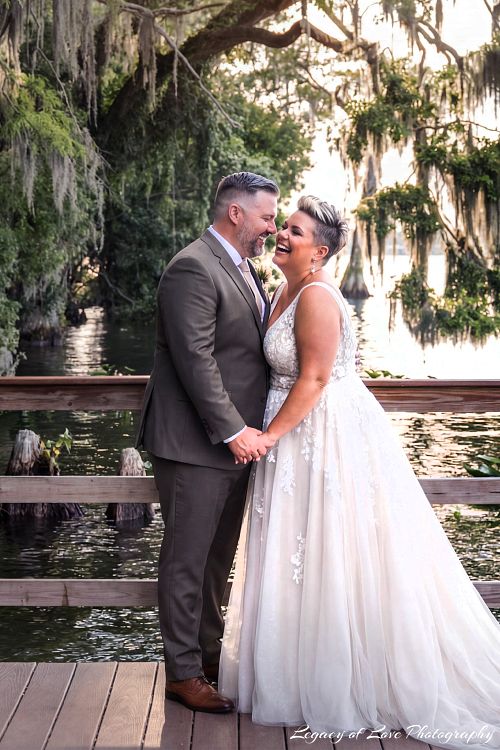 Mature bride and groom celebrating their second marriage in a beautiful Central Florida outdoor setting.