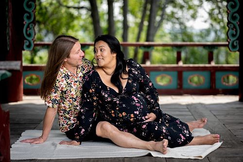 Expecting couple sharing a moment at Government House in Edmonton