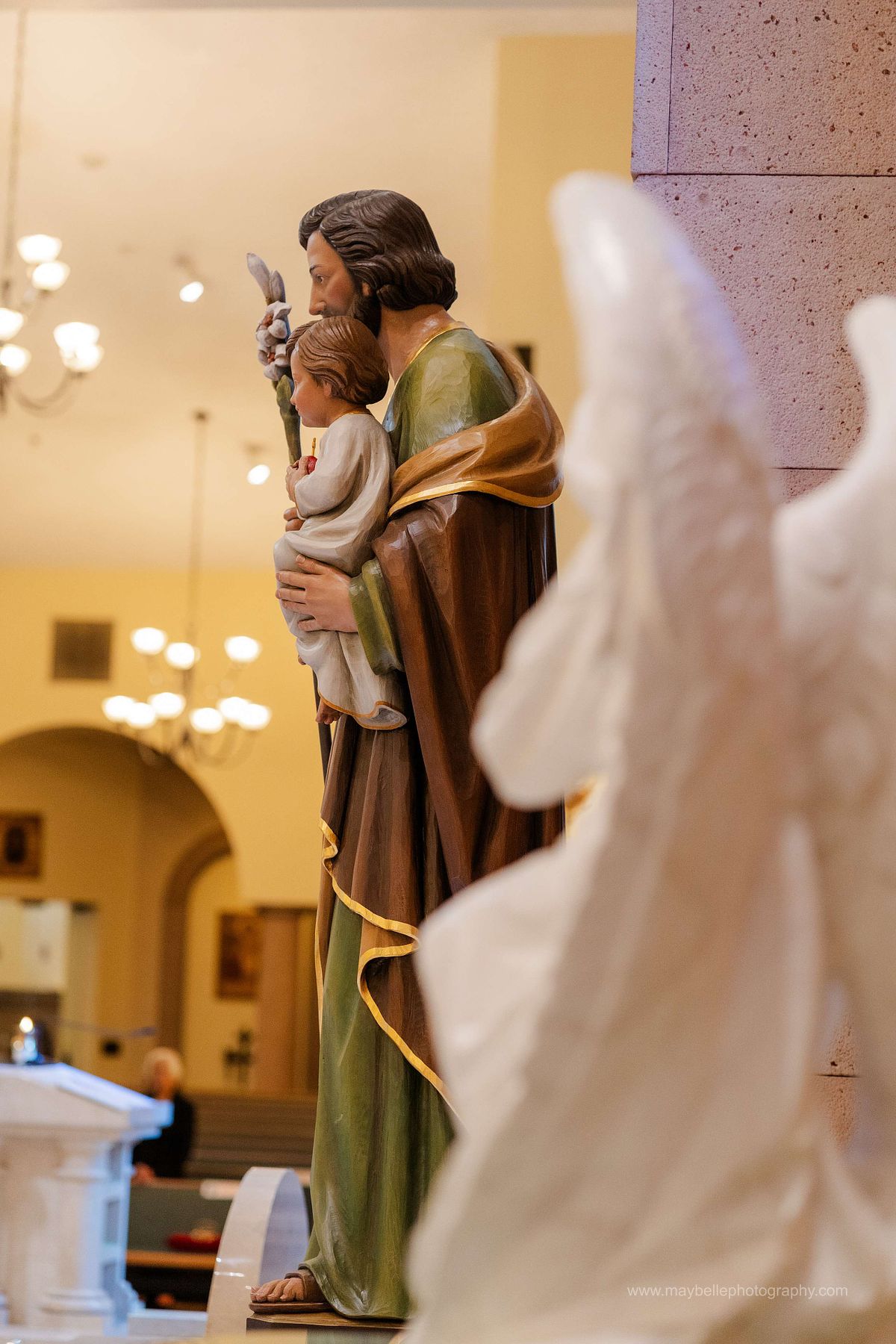 Exchanging vows at Saint Joseph, Husband of Mary Roman Catholic Church in Las Vegas Wedding Photography