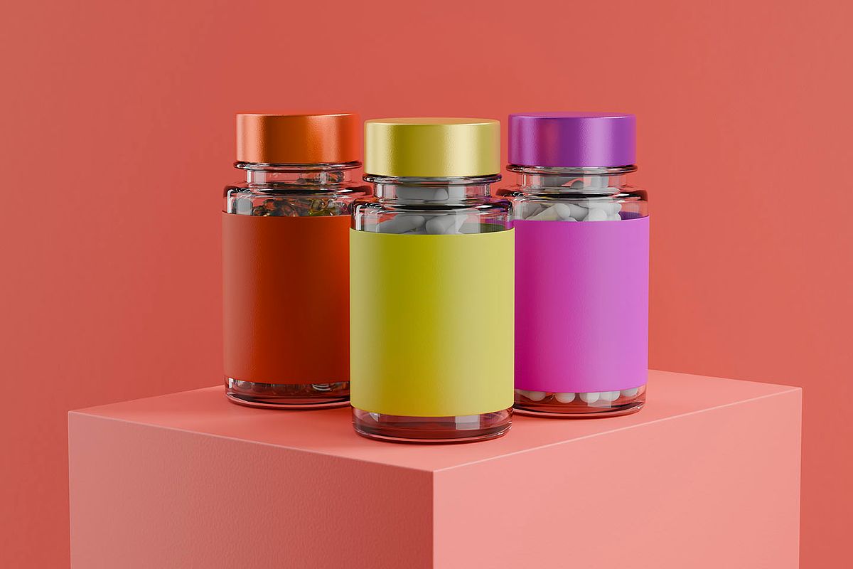 Three cosmetic jars on pink background, 3D product visualization