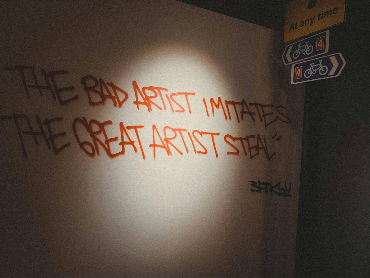 Wall with artist statement written on it