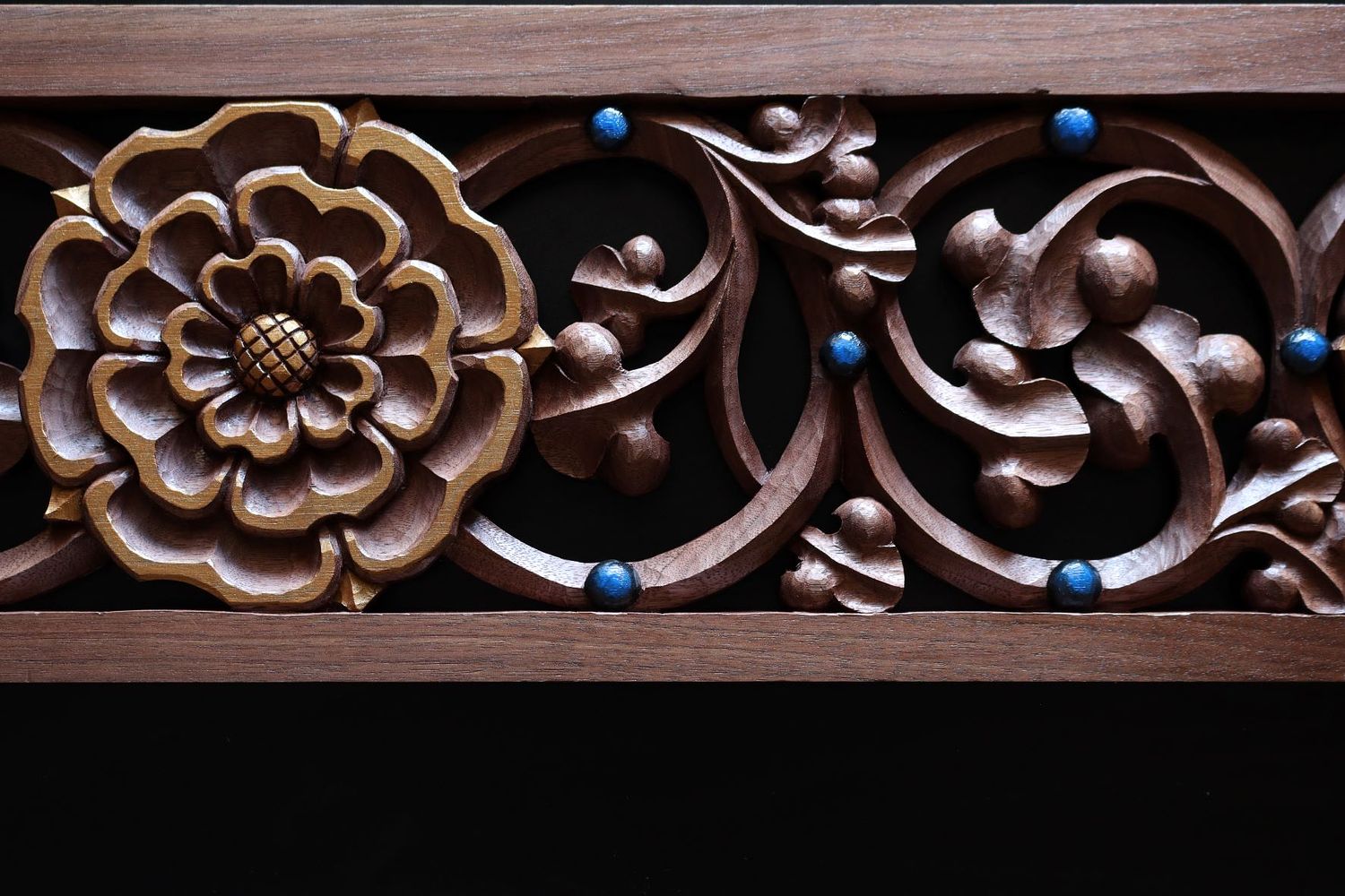 Hand carved panel with vines and a rose in walnut by Wes Baker for high altar at St. Bernadette Catholic Church in Lancaster, Ohio