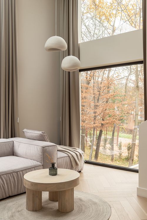 Living room window view overlooking forest landscape &ndash; Faget project