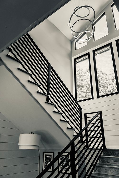 Black and white view up stair