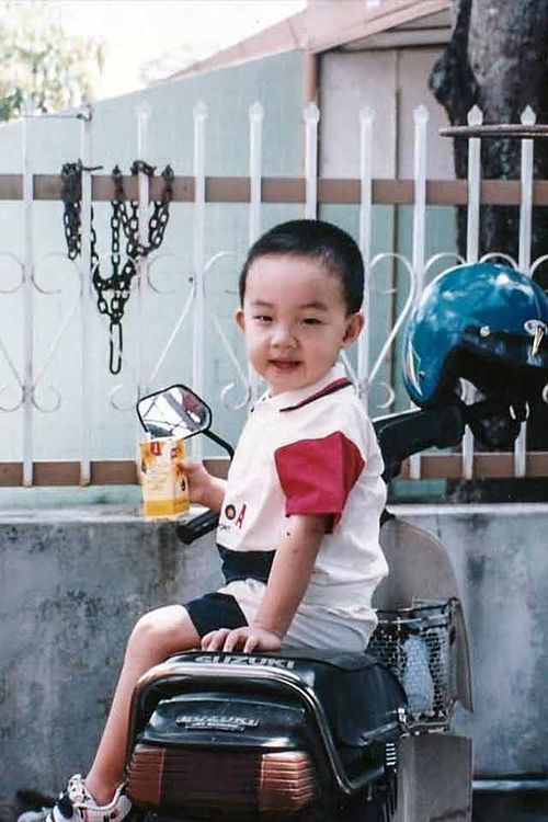 Photograph of me on my Grandpa's Suzuki RC70.