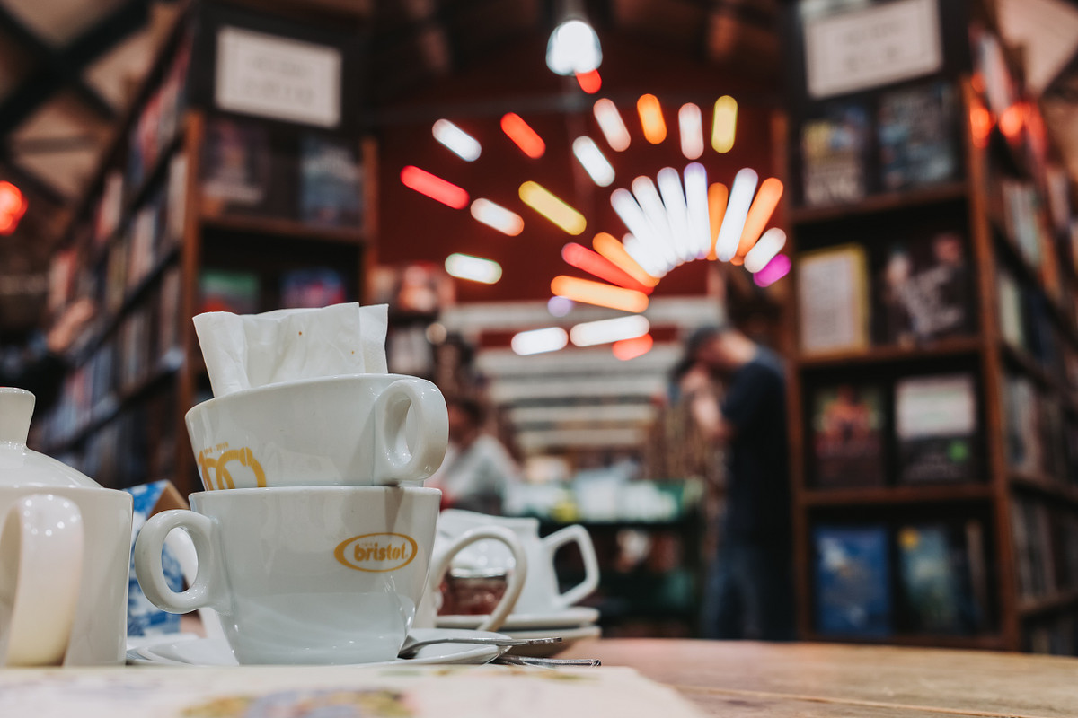 Coffee cups and books