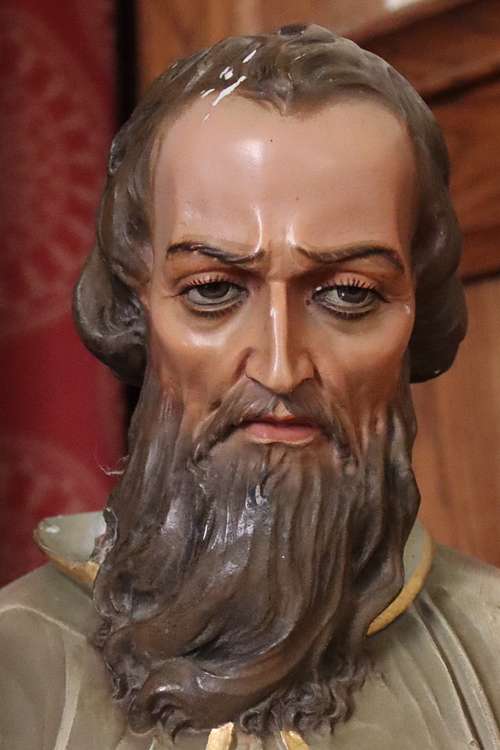 Close up of St Jude statue face in need of restoration