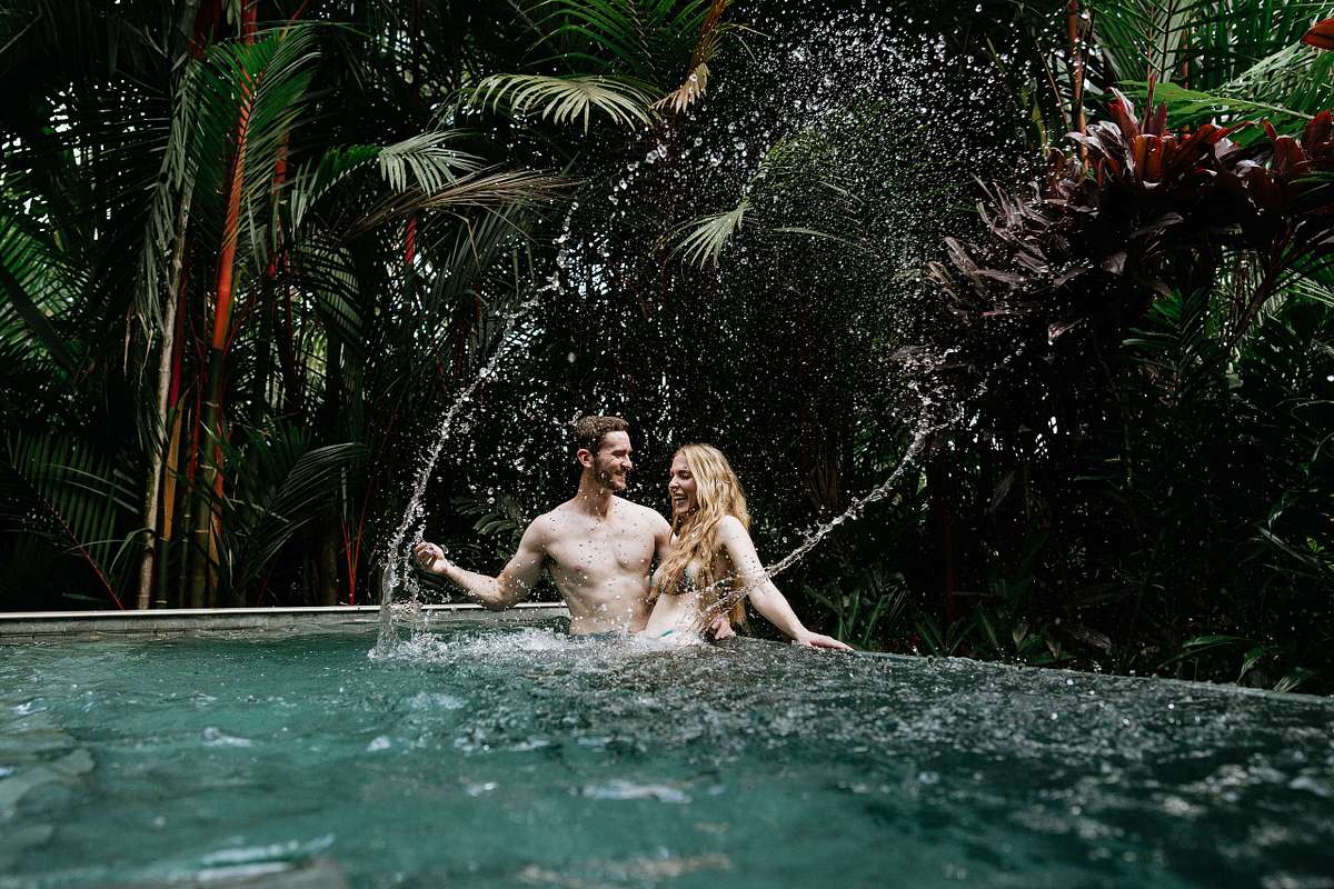 Photographer capturing engagement at Nayara Springs Costa Rica