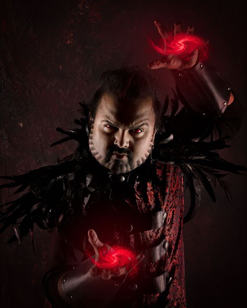 A warlock wields magic.