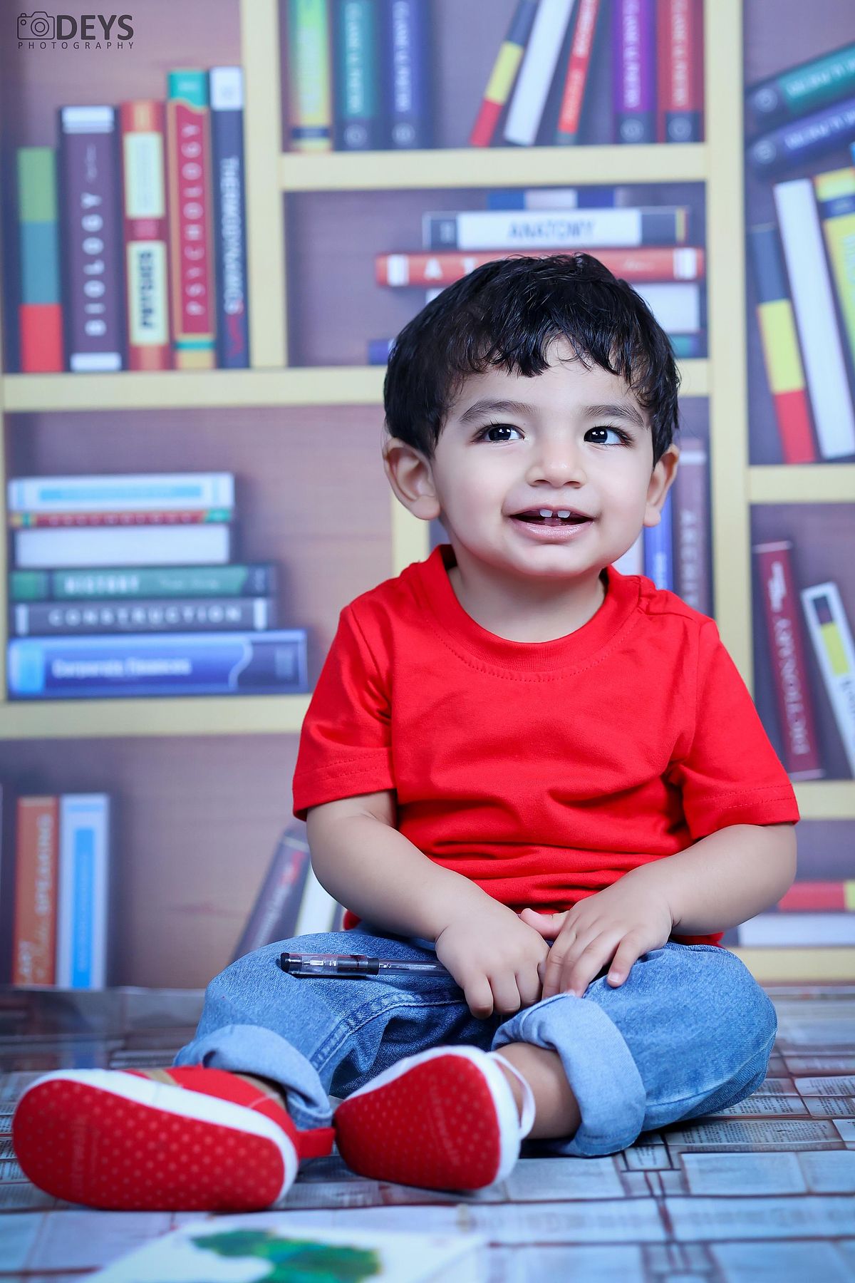 Photoshoot 1st birthday indoor in Noida library theme
