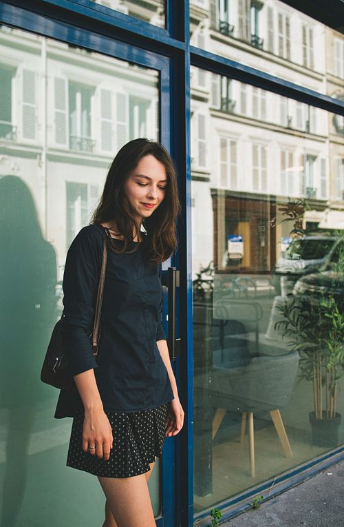 Outdoor portrait in Poznań with natural light, capturing relaxed and authentic expression