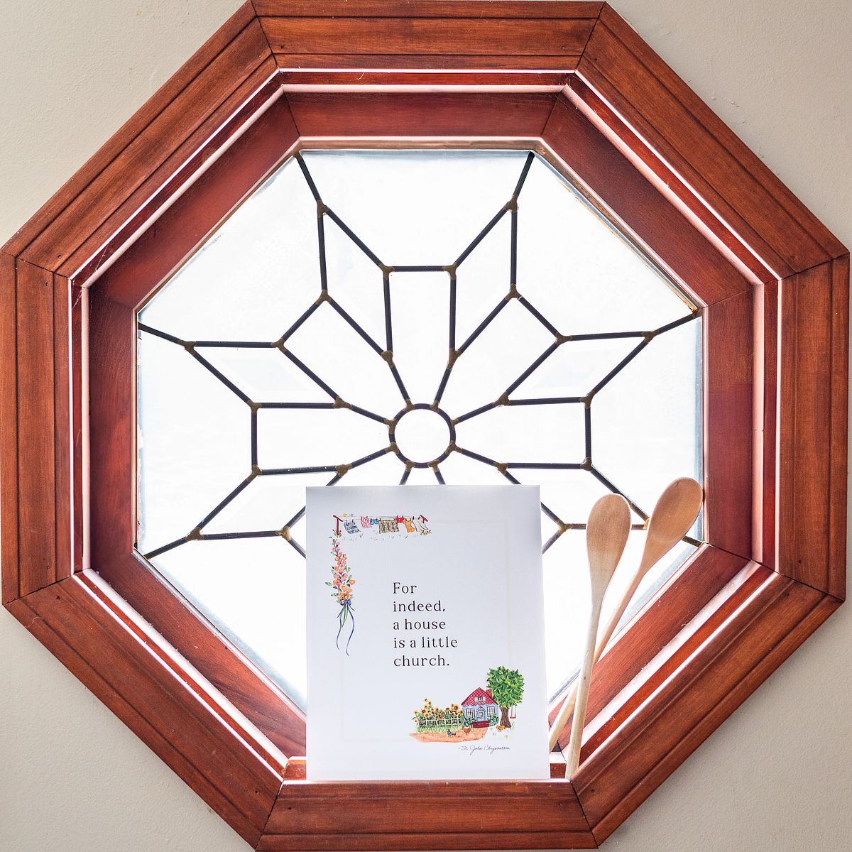 Catholic handmade domestic church artwork in window with wooden spoons taken by cranberry township, pa newborn photographer