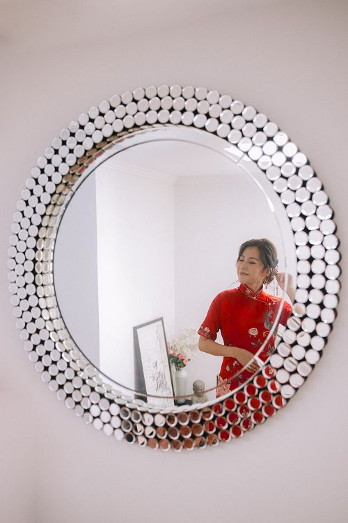Chinese bride getting ready for traditional tea ceremony