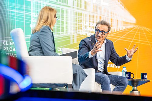 Chobani CEO Hamdi Ulukaya speaks alongside journalist Katie Couric at the Clinton Global Initiative 2024 Annual Meeting during a panel on leadership and equity.