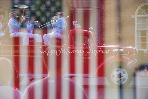 Fourth of July parade capturing civic pride and community spirit in a small town.