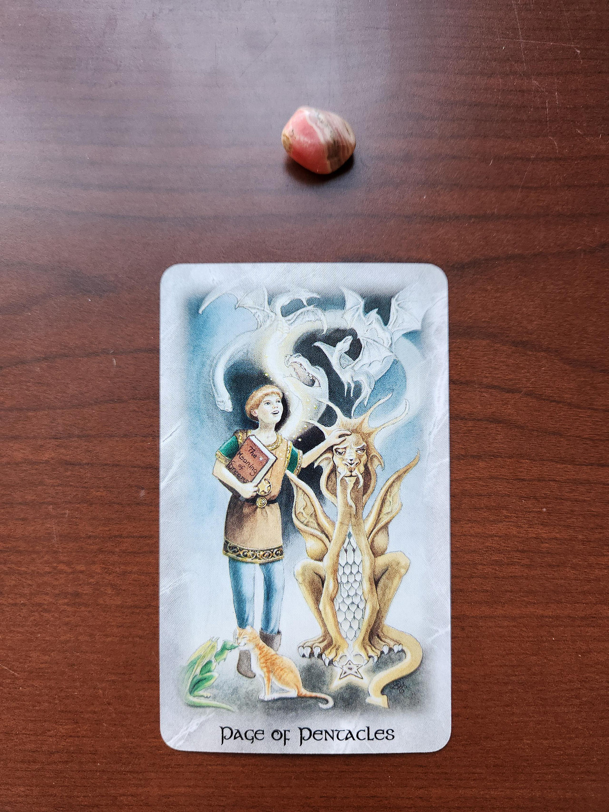 Rhodochrosite and Page of Pentacles