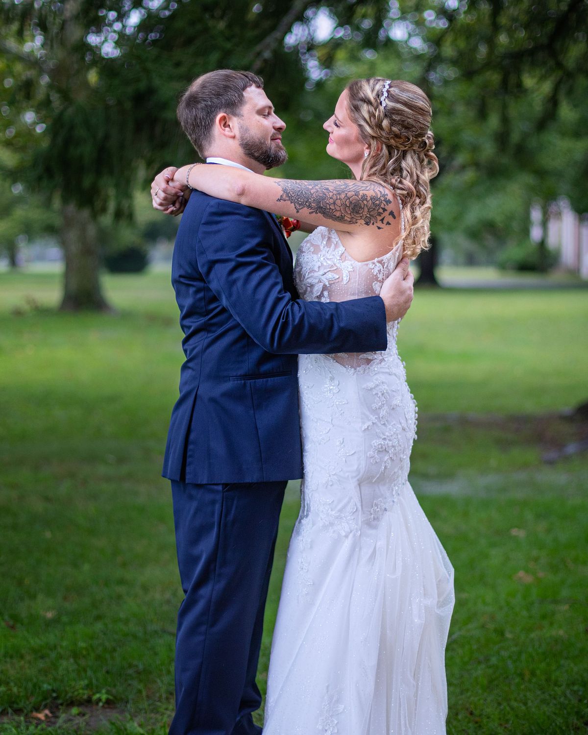 natural light photo of a newly wed couple in the porch at ross mansion in seaford de