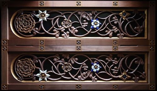 Same hand-carved panels with detail paint on the flowers