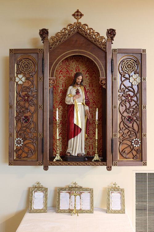 total statue restoration of antique Sacred Heart with a custom, hand-carved shrine with vines and flowers full of Catholic symbolism related to the statue