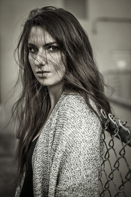 Editorial senior portrait with moody high-contrast lighting Lake St. Louis