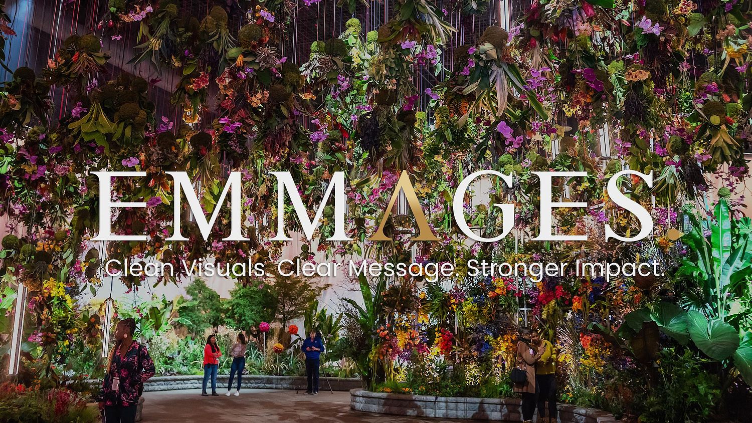 Philadelphia Flower Show installation at the Pennsylvania Convention Center, featuring a large suspended floral display and visitors exploring the immersive exhibition space.
