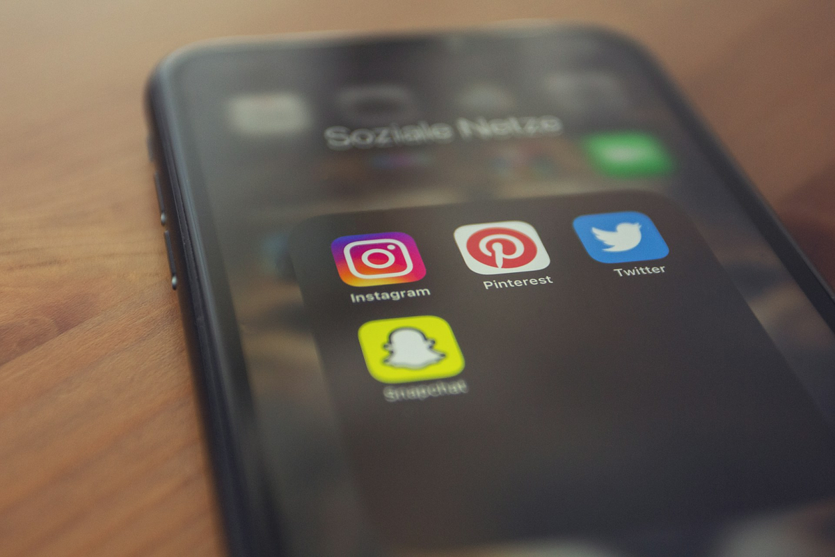 Phone screen with social icons