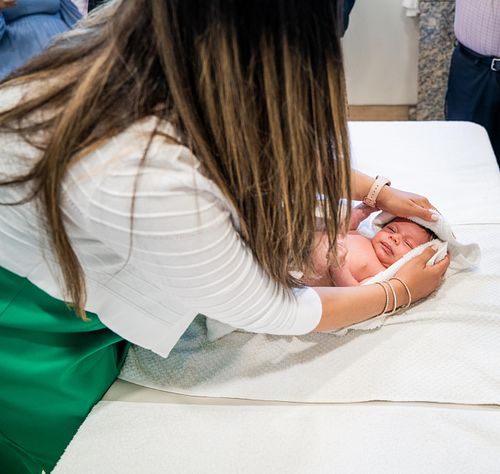baby baptism ceremony at Ottawa church captured by Kameel Photography