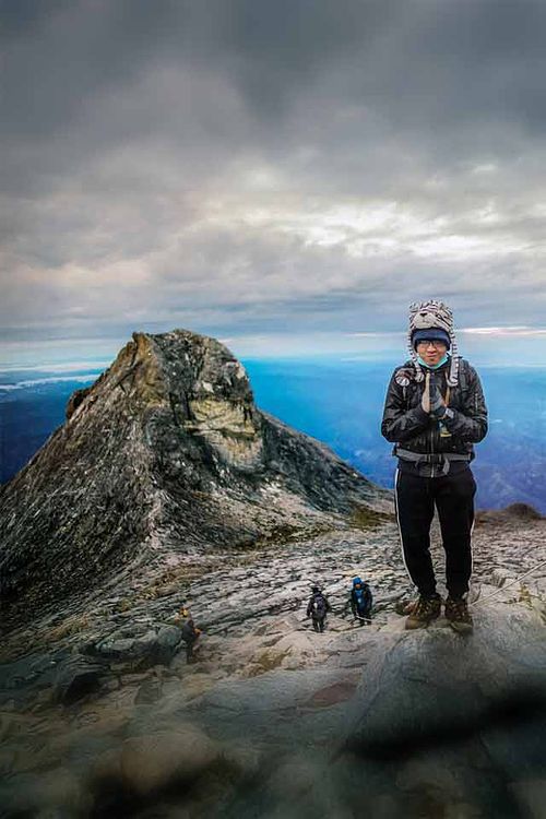 Photograph of me on the peak of Mount Kinabalu.