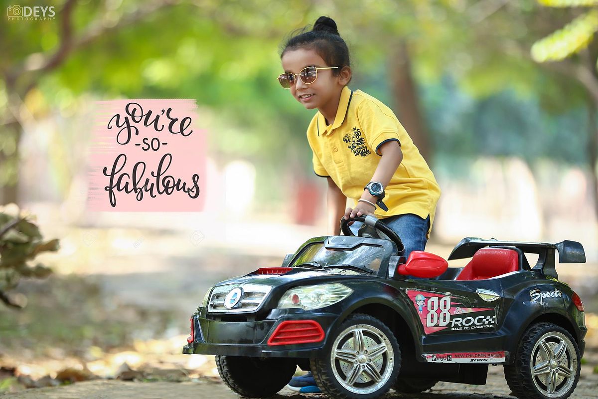 Kid driving a car photoshoot