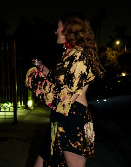 White woman in tie dye shirt dress Los Angeles street style